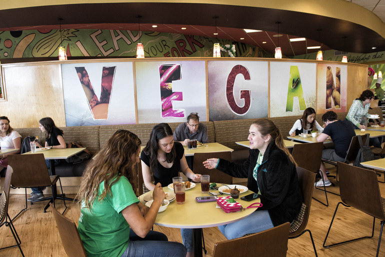 Students at UNT's Vegan restaurant, Mean Greens